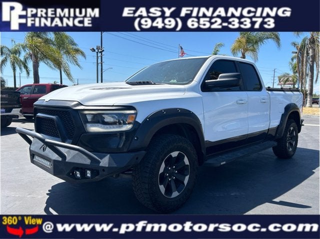 2019 RAM 1500 REBEL 4X4 1500 BACK UP CAM CLEAN in Bright White Clearcoat — front three-quarter view